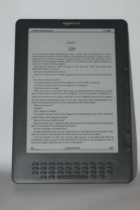 A greyscale e-ink Kindle displaying a dense page of black and white text with no pictures.